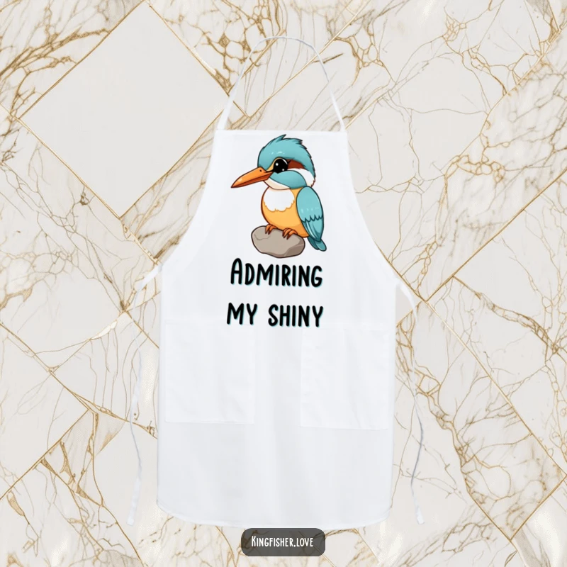 Funny apron with a kingfisher holding a shiny pebble in its beak, head tilted curiously, perfect for humorous kitchen activities.