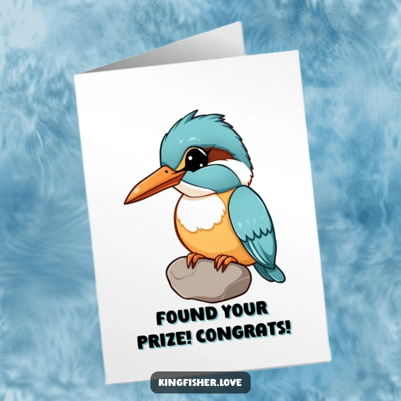 Funny Free Printable Congratulations Card showing a kingfisher tilting its head curiously, holding a shiny pebble in its beak.